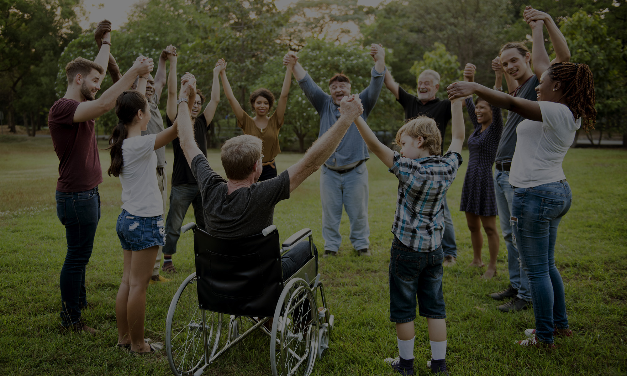 Group,Of,People,Holding,Hand,Together,In,The,Park